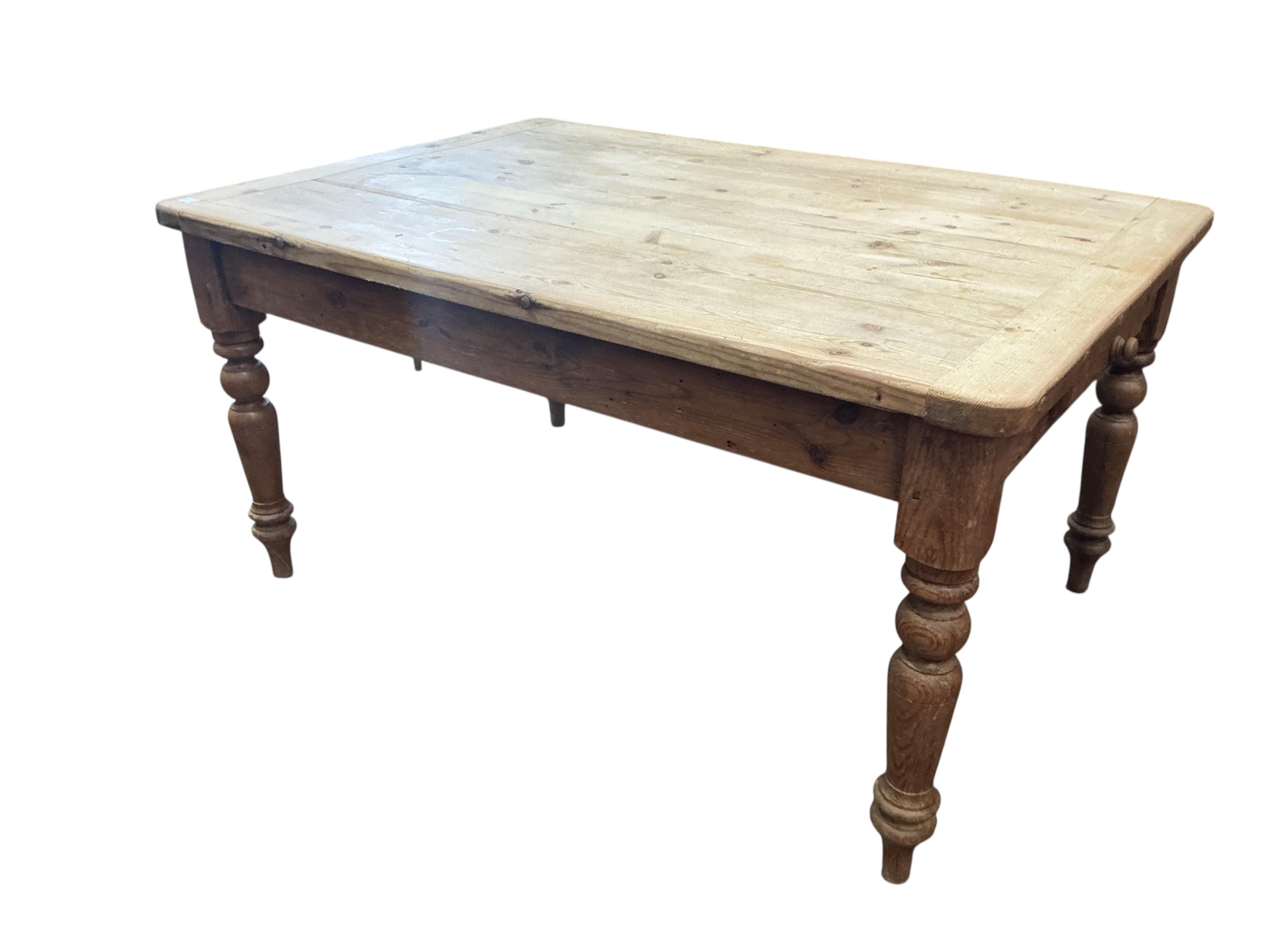 A Victorian style pine kitchen table, fitted two drawers, width 152cm, depth 106cm, height 78cm